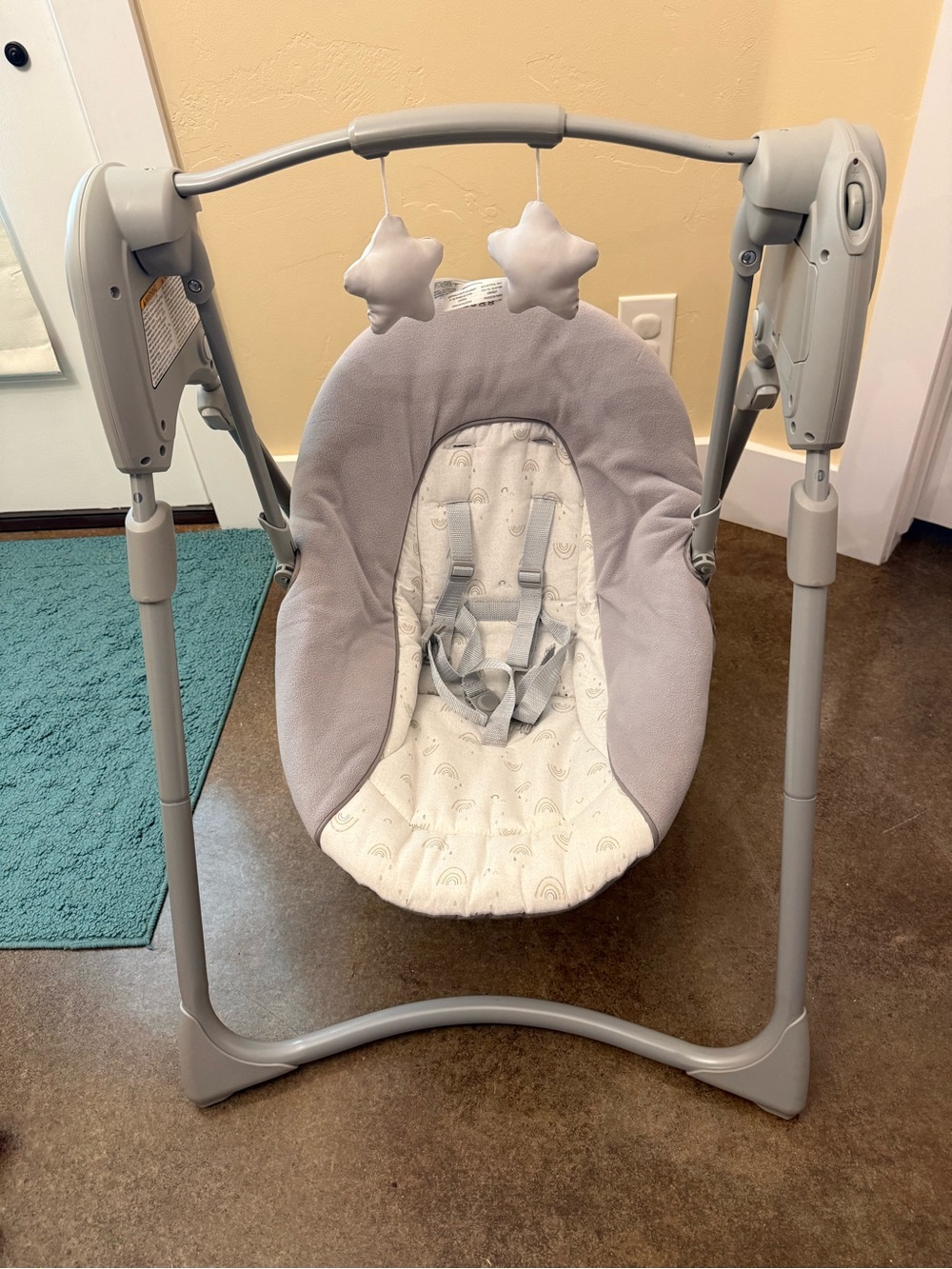 Plush Gray Baby Swing with Star Toys and Secure Harness